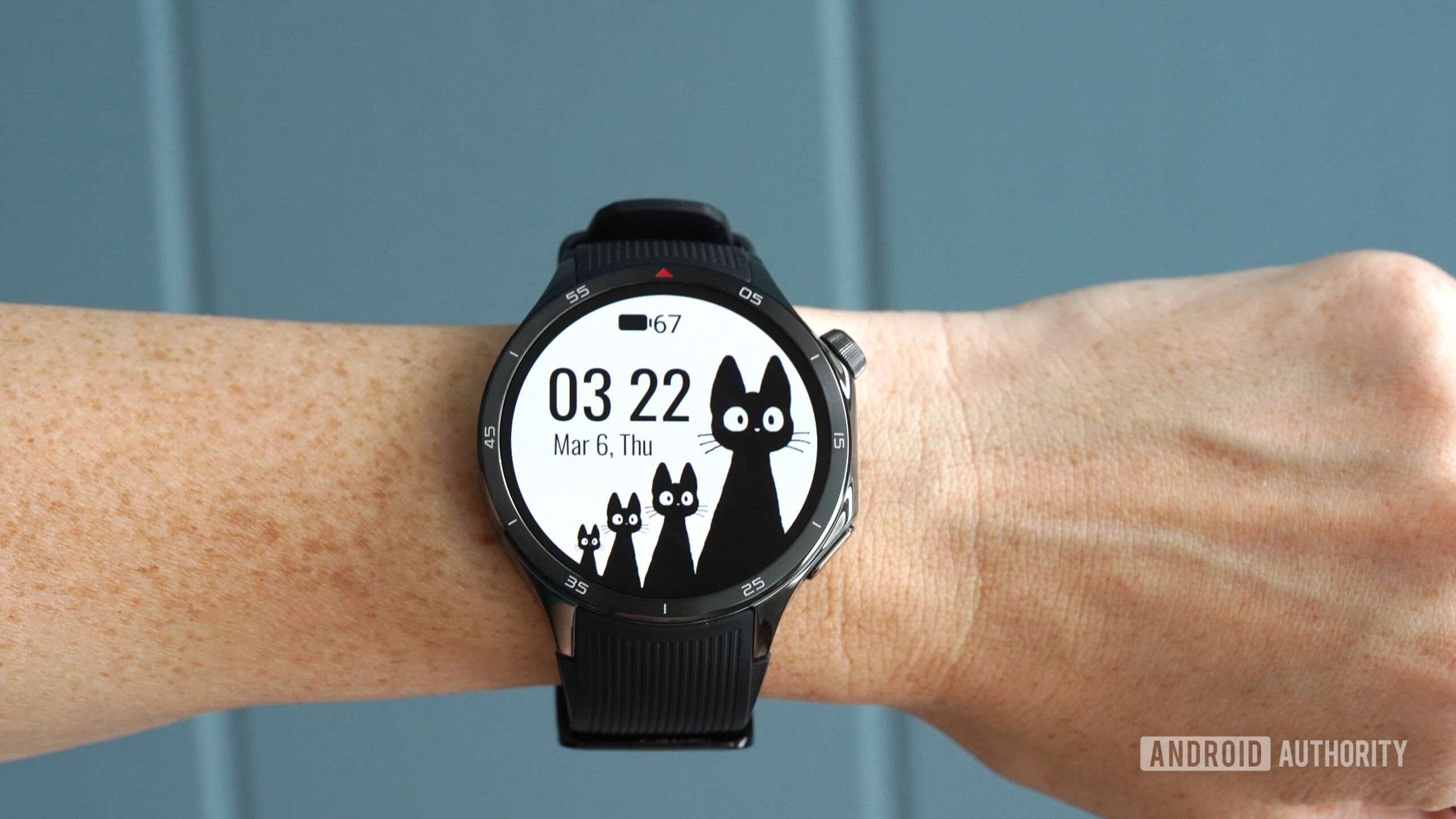 Black Cats WearOS Watch Face A OnePlus Watch 3 displays the Black Cats WearOS watch face.